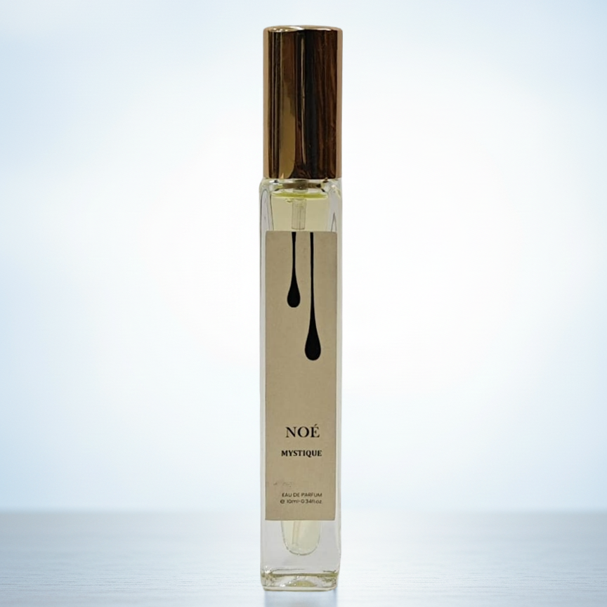 Perfume bottle labeled 'NOé' on a light blue background