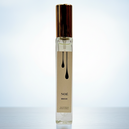 Perfume bottle labeled 'NOE on a light blue background