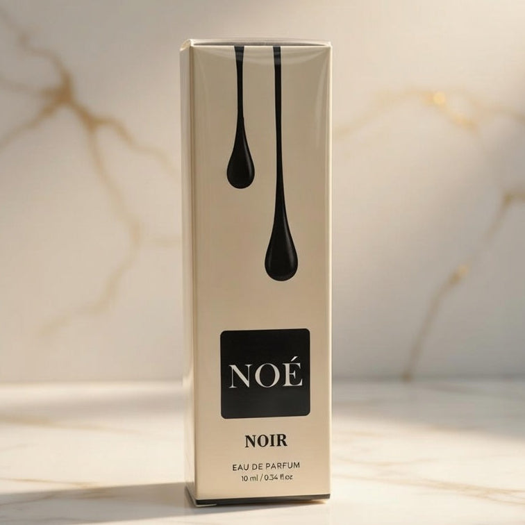 NOE perfume bottle on a marble surface