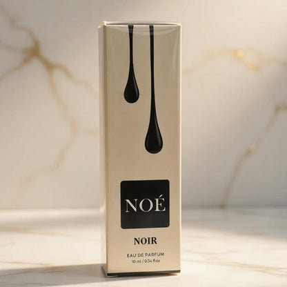 NOE perfume bottle on a marble surface