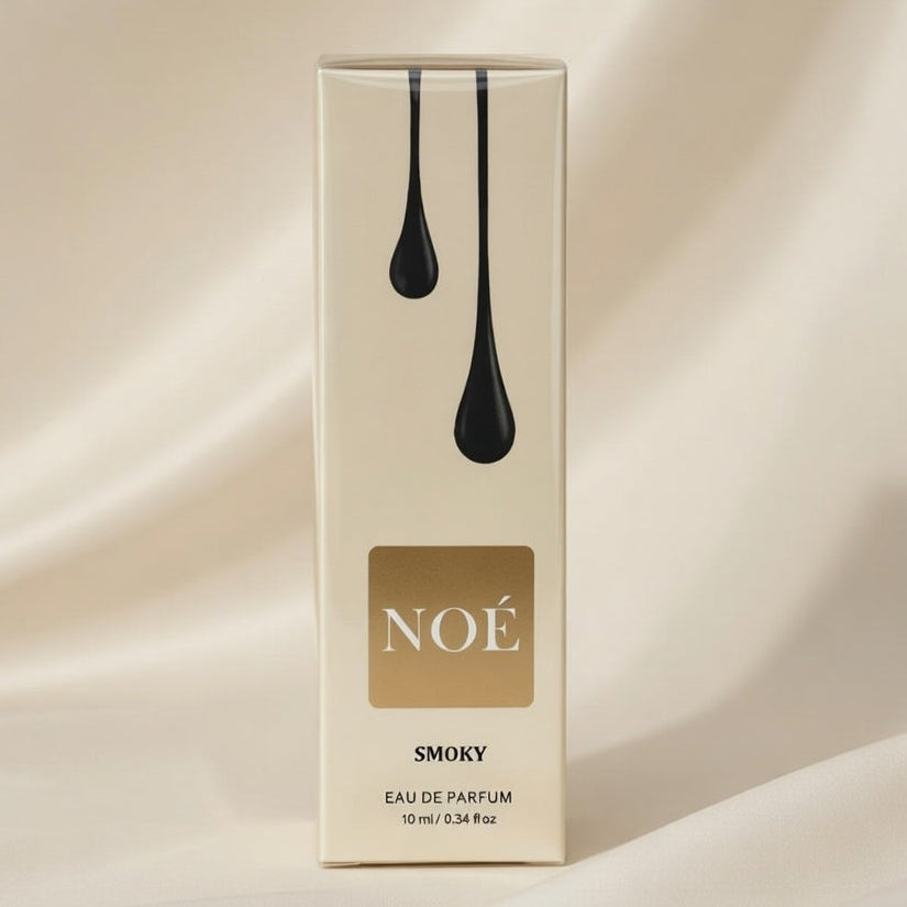 NOE Smoky Oudh perfume packaging on a beige background